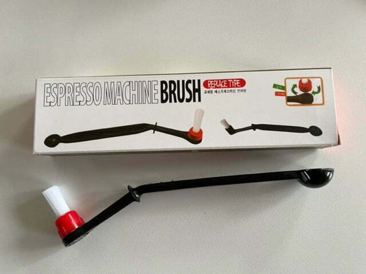 Shower plate cleaning brush and measuring spoon